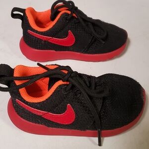 Kids Black and Red Nike Shoes